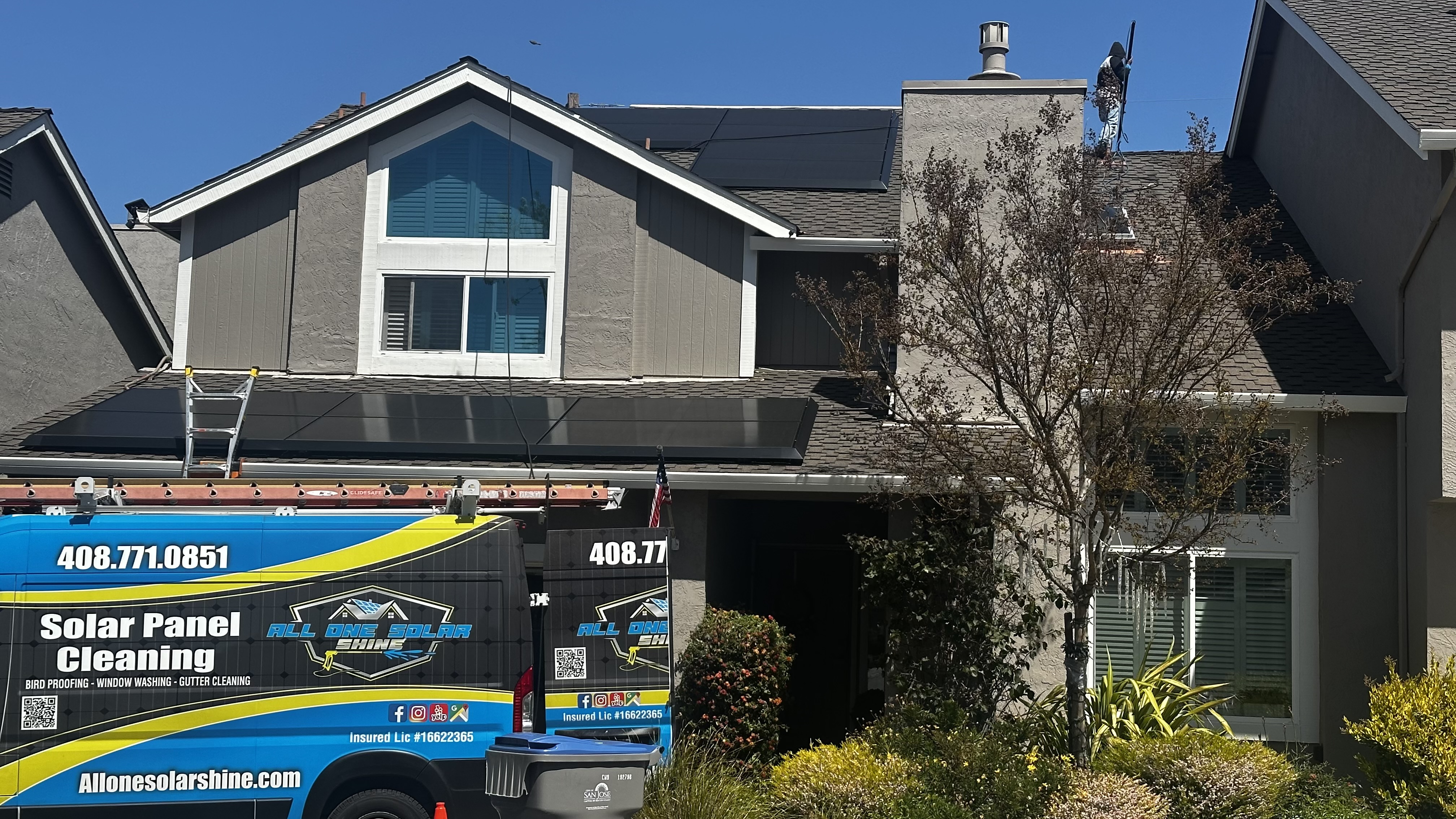 All One Solar Shine technician working on a rooftop solar array