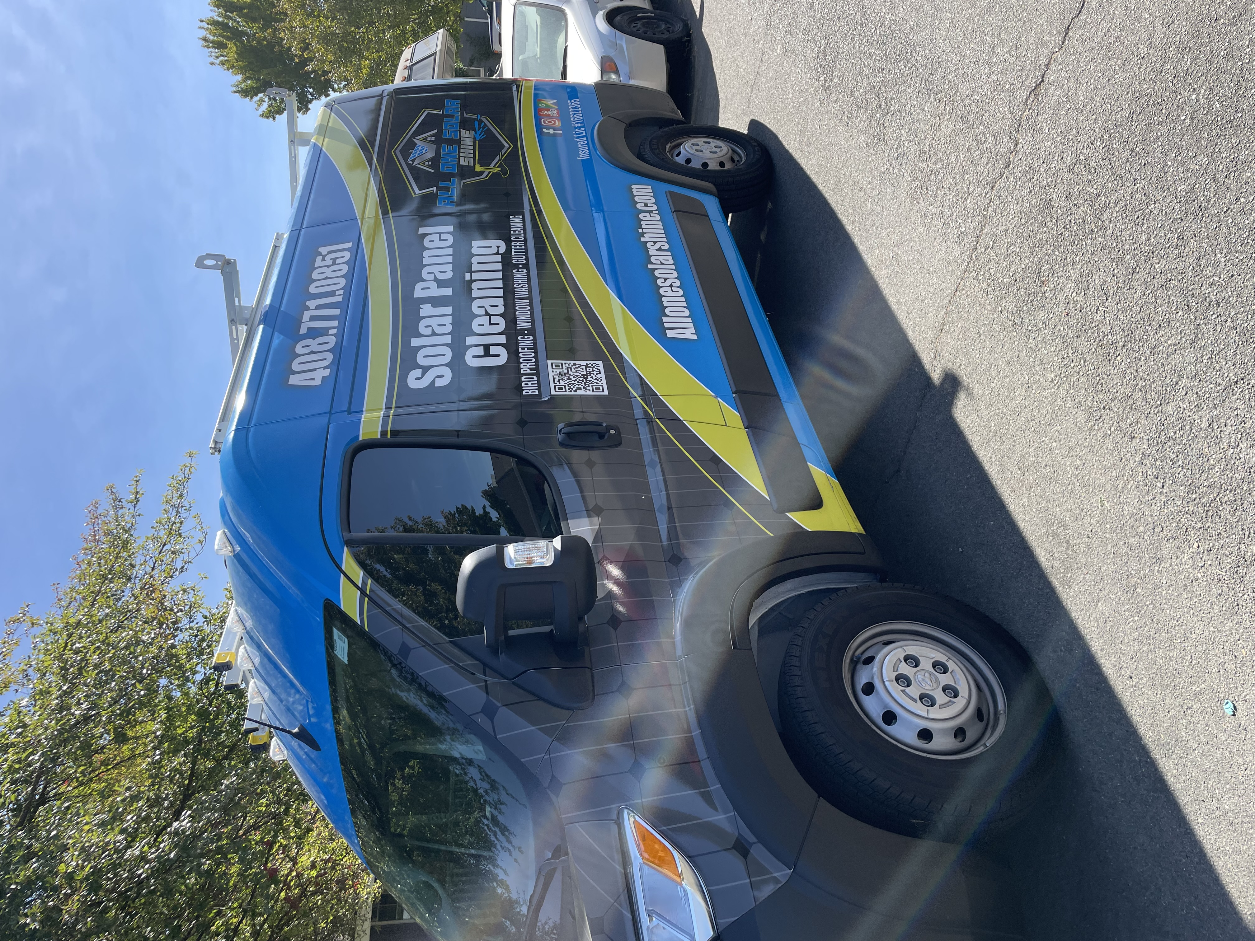All One Solar Shine technician cleaning a commercial roof