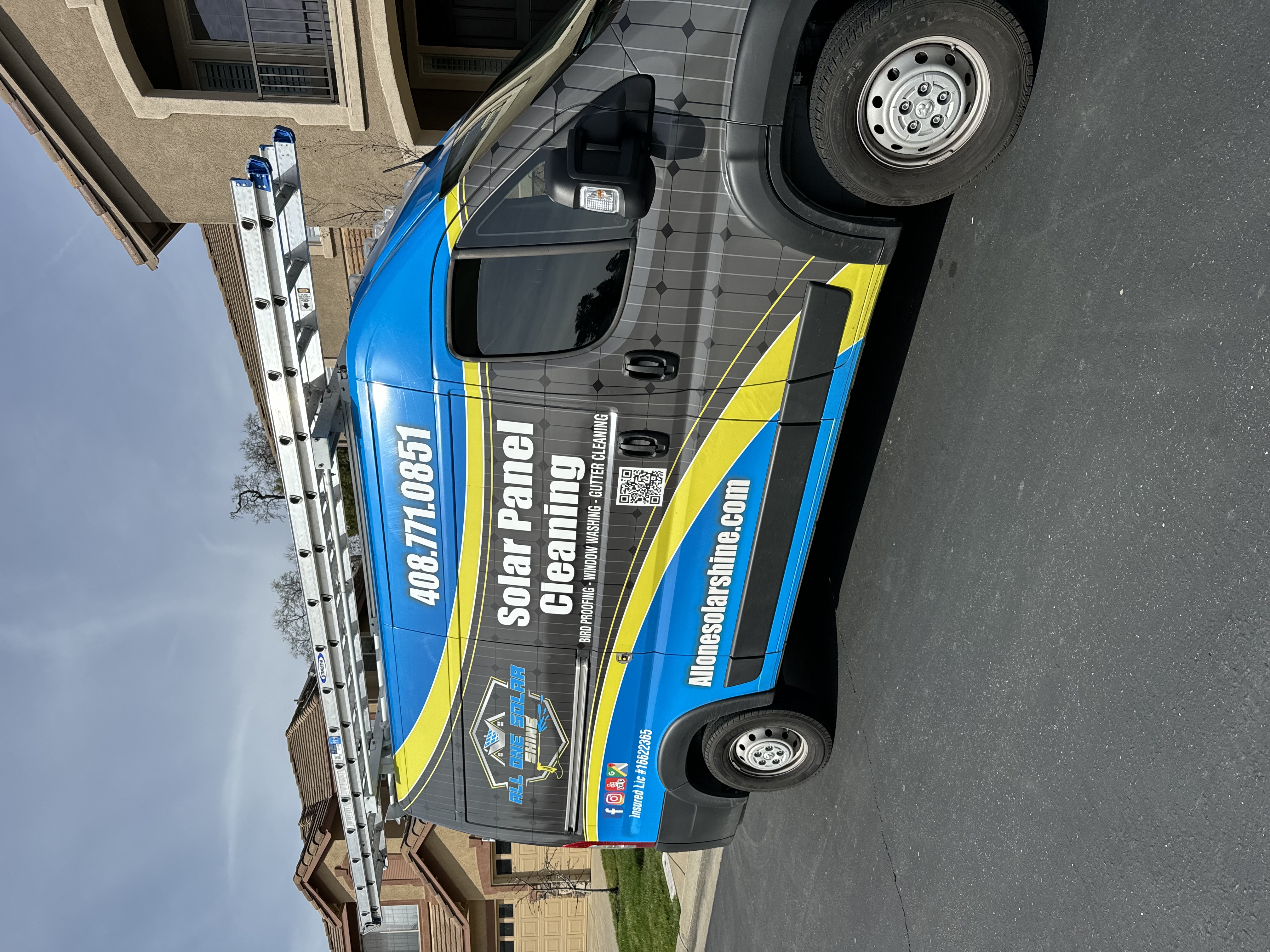 All One Solar Shine service van on a commercial property street